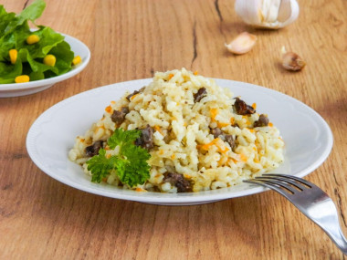 Куриные сердечки с рисом